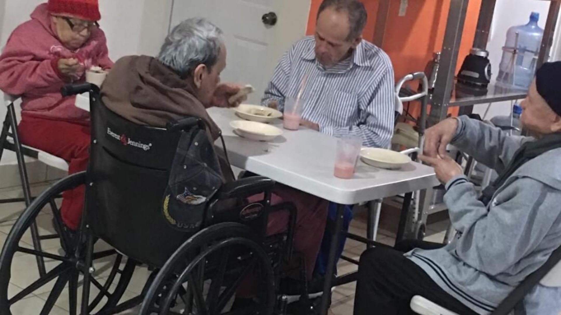 thumbnail of Casa Simeón residents sitting at a table enjoying lunch