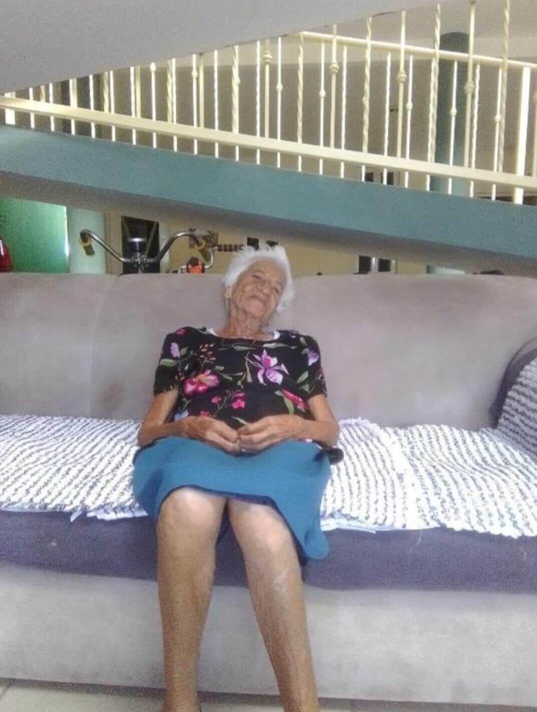 resident sleeping on a couch
