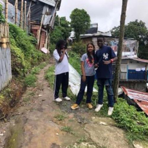 thumbnail of children standing in their neighborhood