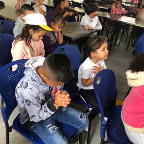 thumbnail of children earnestly praying