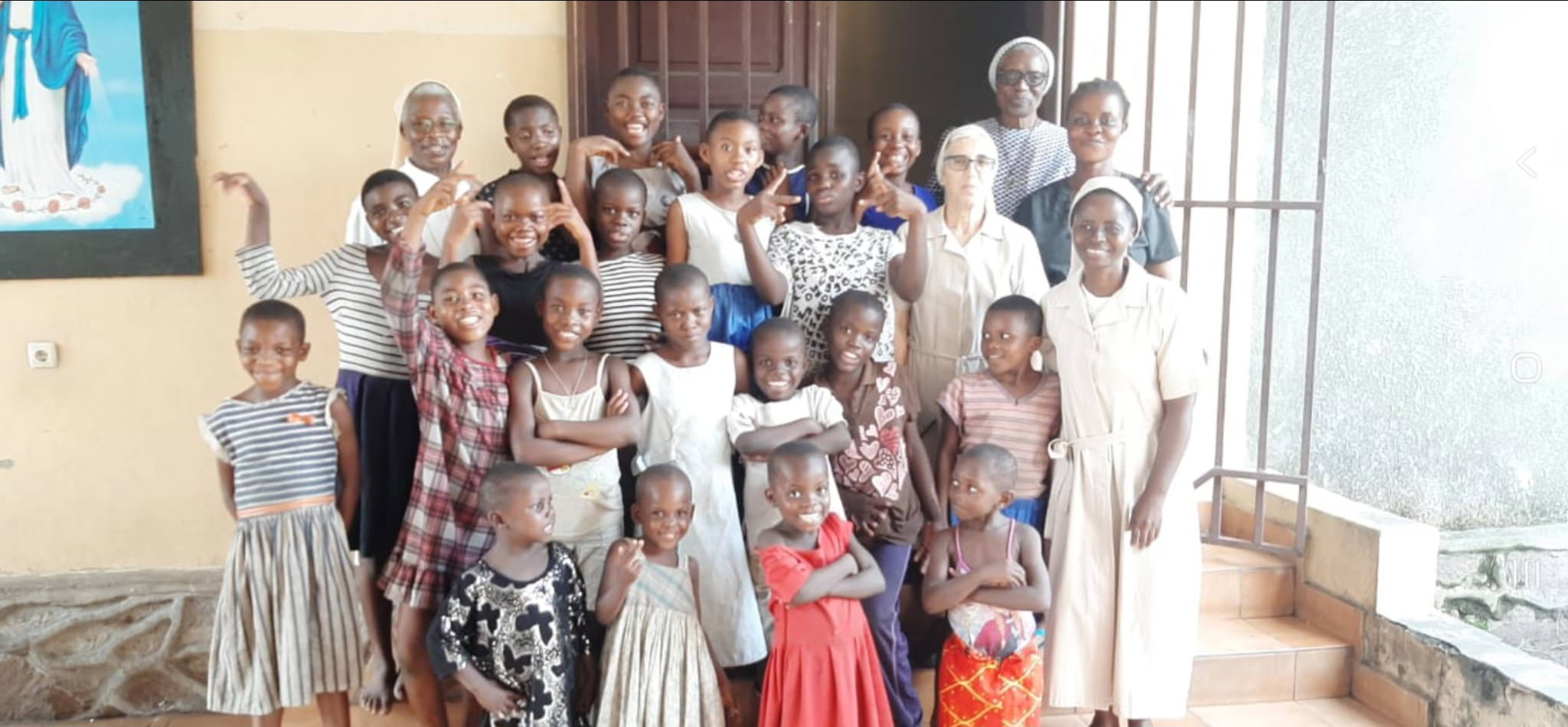 children smiling with their instructors