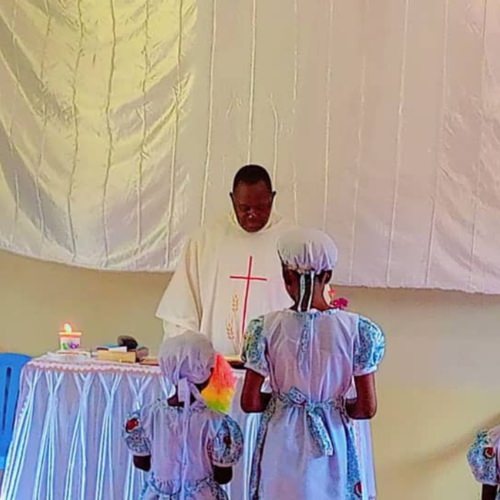 thumbnail of a priest leading a church service