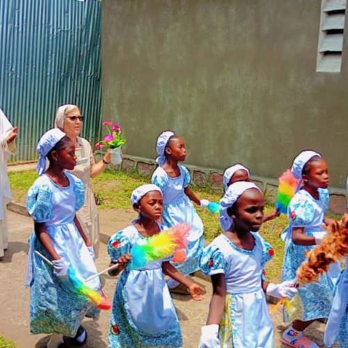 thumbnail of girls leading a processional