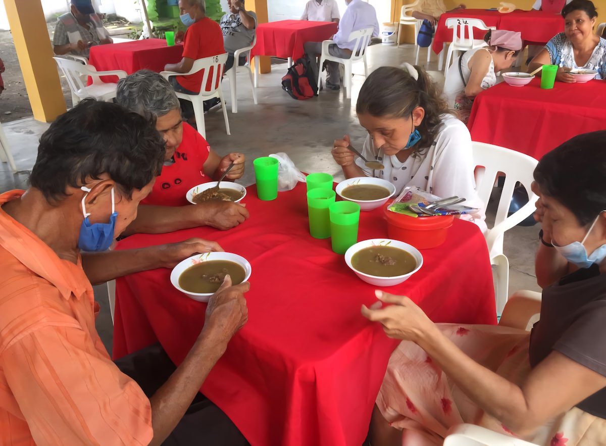 people eating soup