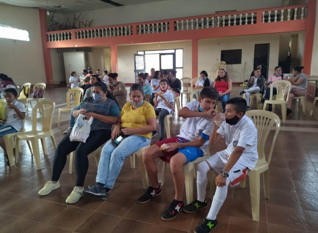 people sitting in a school center