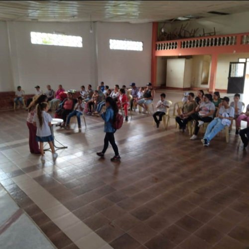 thumbnail of people gathered for an assembly