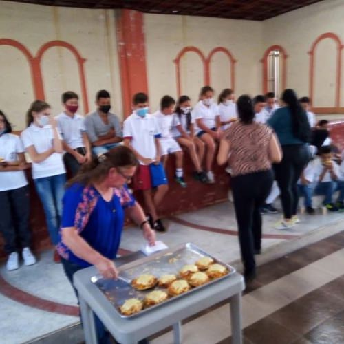 thumbnail of children being served lunch